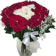 Bouquet of flowers of red roses and white chrysanthemums