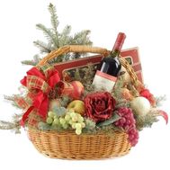 A fruit basket for the New Year with flowers and a Christmas tree