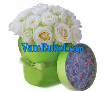 Delicate white roses in a box